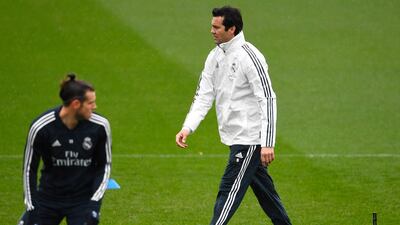 Santiago Solari oversees training with Welsh forward Gareth Bale in the foreground. AFP