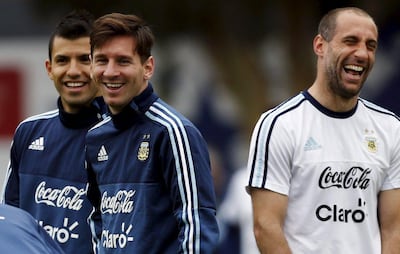 Lionel Messi, centre, in Argentina training alongside Manchester City duo Sergio Aguero, left, and Pablo Zabaleta in 2015. Reuters