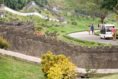 A Great Wall of China miniature at Splendid China Folk Culture Village. Alamy