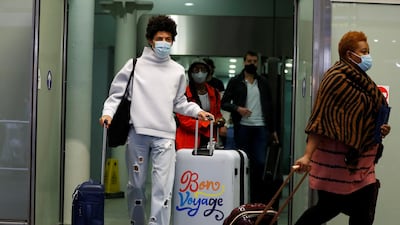 Passengers arrive from Paris at Eurostar terminal in London as Britain imposes a 14-day quarantine on arrival from France from Saturday, following a surge in of the coronavirus REUTERS