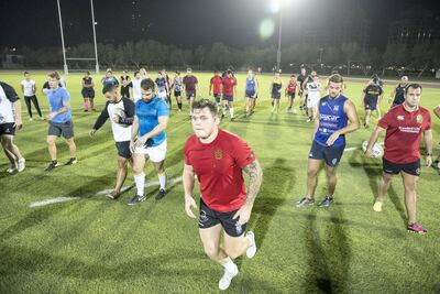 Members of the new Dubai Sports City Eagles rugby team during training at Dubai Sports City. Antonie Robertson / The National