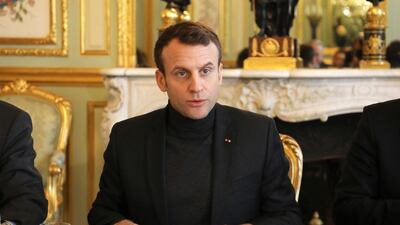 French president Emmanuel Macron speaks during a meeting to strengthen links between France and Russia on February 9, 2018, at the Elysee palace in Paris. Ludovic Marin / AP