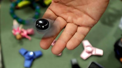 No 9: The fidget spinner. Did you get one? Carlos Osorio / AP Photo