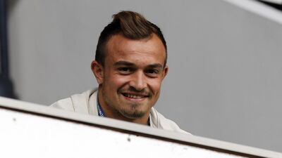 Stoke City's Xherdan Shaqiri watches his team's 2-2 draw with Tottenham Hotspur from the stands at White Hart Lane on Saturday. Ian Kington / AFP / August 15, 2015