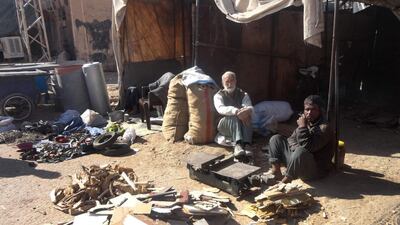 Syrians in besieged Deir Ezzor do what they can do survive, including buying furniture to chop up and sell for firewood to use for cooking or heating because fuel is in short supply. Ayham Al Mohammad / Agence France-Presse