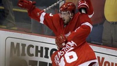 Darren Helm is congratulated after his overtime goal sealed the 2-1 win.