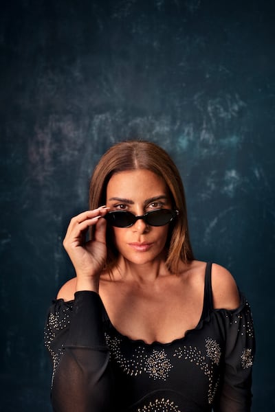 Jersey maxi dress, Dh5,245, Rabanne. Sunglasses, Dh1,190, Gentle Monster
