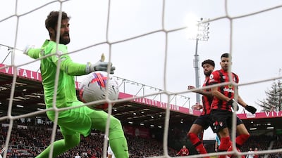 Bournemouth's Philip Billing scores the opening goal past Alisson Becker in the 1-0 Premier League win against Liverpool at the Vitality Stadium on March 11, 2023. AFP
