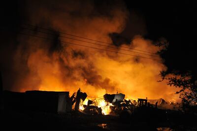 The fire at Masafi's Friday Market destroyed a total of 29 shops in March 2015. Courtesy Aletihad