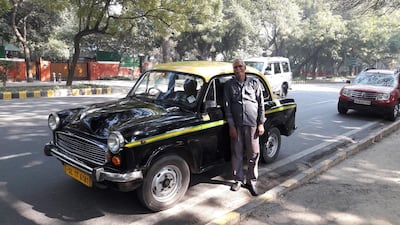 Surjit Gill next to his Ambassador on Lodhi Road in New Delhi. Since the heady days of the 1960s to 1980s, the car known — affectionately as the ‘Amby’ — has fallen on bad times and its manufacturer, Hindustan Motors, is now selling the iconic brand to French car maker Peugeot for US$12 million. Amrit Dhillon for The National