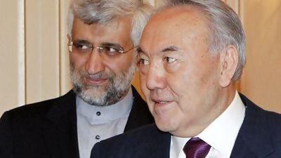Kazakhstan's president, Nursultan Nazarbayev, right, meets Iran's chief nuclear negotiator, Saeed Jalili, in Almaty on Monday. Shamil Zhumatov / Reuters