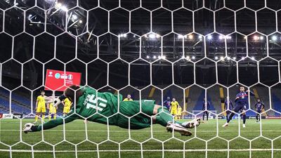 Kazakhstan goalkeeper Aleksandr Mokin's saves Kylian Mbappe's penalty in Nur-Sulta. AFP