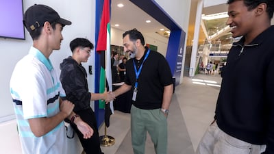 Teachers congratulate students