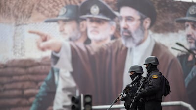 A billboard shows a graphic depicting Iran's supreme leader Mojtaba Khamenei with military commanders as people attend the annual anti-Israeli Quds Day in Tehran. Getty Images
