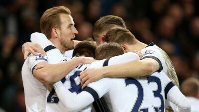 Harry Kane, left, scored twice and Dele Alli once to lead Tottenham to a 3-0 win at Norwich City. Matthew Childs / Reuters