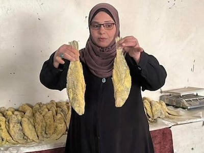 Jawaher Hammouda making fesikh, a fish delicacy, for Eid Al Fitr. Photo: Jawaher Hammouda