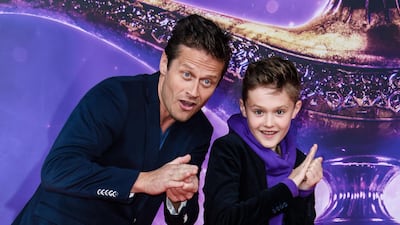 German actor Roman Knizka and his son Leo at the gala screening in Berlin. EPA.