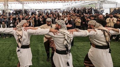 Palestinian dancers perform the traditional dabka (or dabke) dance at a wedding party in the village of Salem, east of Nablus, in the Israeli-occupied West Bank. AFP