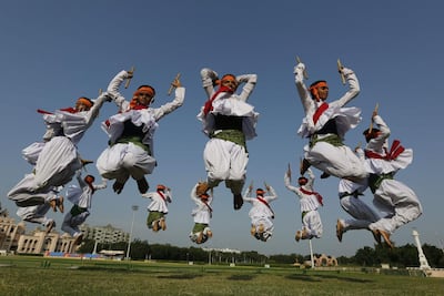 Students of Swaminarayan Gurukul in traditional attire practise the garba ahead of Navratri in Ahmedabad. AP