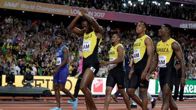 Jamaica's Usain Bolt, Yohan Blake, Julian Forte and Omar McLeod leave the track after the men's 4x100m final at the World Championships in which cramp forced Bolt to pull up on the final leg. Matt Dunham / AP Photo