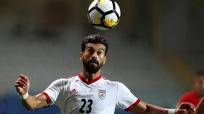 27 Iran || The look: Sensible white Adidas strip. Iran has moved on emblazoning 'Iran' on the front of their shirts. They've also dropped the green trim for red. || Would I wear it? No. || Photo: Osman Orsal / Reuters