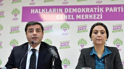 This file photo taken on November 01, 2015 shows the co-chairs of the pro-Kurdish People's Democratic Party (HDP) Selahattin Demirtas (L) and Figen Yuksekdag addressing a press conference in Ankara. AFP