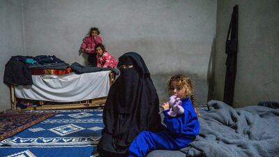 A woman released from Al Hol camp with her children under tribal agreements says she has not been accepted by Syrian communities who accuse her of association with ISIS. Luke Pierce for The National