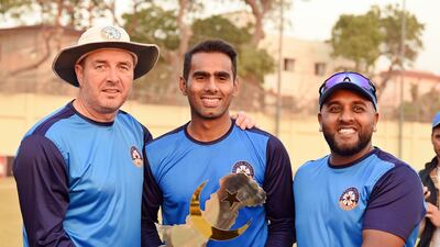 Former UAE coach Paul Franks, left, and Bilal Shafayat, right, celebrate leading Central Punjab to the Pakistan Cup title. Courtesy PCB