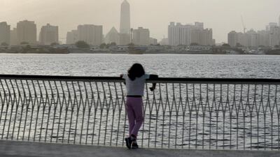 The sun sets over Dubai Creek Harbour.