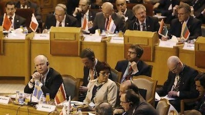 Britain's foreign secretary William Hague (left) attends the joint Arab League-European foreign ministers' meeting on Syria, at the Arab League’s Cairo headquarters.