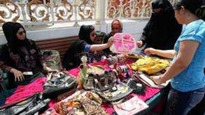 Azza Alaskar, left, and Nuha Asad at their stall in the flea market organised at Al Qasba in Sharjah.