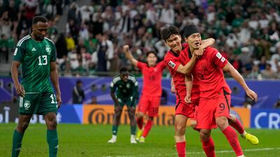 South Korea's Cho Gue-Sung, front, celebrates with teammates after scoring his side's late equaliser to make it 1-1. AP