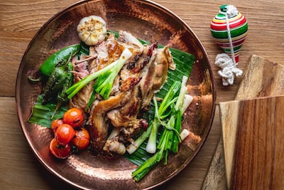 The roasted meats are cooked in mesquite wood, flown over from Mexico. Courtesy Puerto 99