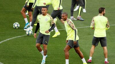 Manchester City's Fernandinho, centre, and Gabriel Jesus, left, during training in the Ukraine. Reuters