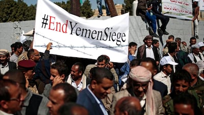 Yemenis take part in a protest calling for the reopening of Sanaa airport to receive medical aid in front of the UN offices in Sanaa, Yemen. AP