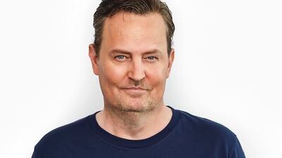 Matthew Perry, who played Chandler in 'Friends', wears a 'Stop the Q-tip when there's resistance' T-shirt from the limited edition Cast Collection of merchandise