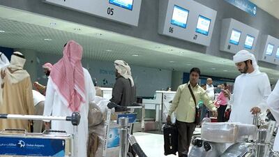 Falcons and their owners at the flydubai business class check-in at Dubai International Airport’s Terminal 2. The birds were on their way to Azerbaijan, where there was much more prey and where the Azeris were eager to learn the art of falconry from the Emiratis. Photo by Frank Kane