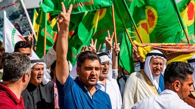 Syrian Kurds take part in a demonstration against Turkey's planned operations in Syria. AFP