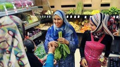 The new Abu Dhabi Souk Central Market is open but not all stores are open. A group of women shop for fruits and vegetables at the Unifrutti Fresh Harvest Fruits & Vegetable market inside the Central Souk.