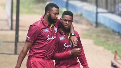 West Indies captain Kieron Pollard, left, and Shimron Hetmyer in Cuttack on Saturday. AP