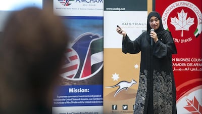 Manal Al Bayat, the vice president of engagement for Dubai Expo 2020, speaks on opportunities for small businesses and graduate jobseekers at an event in Abu Dhabi. Mona Al Marzooqi / The National