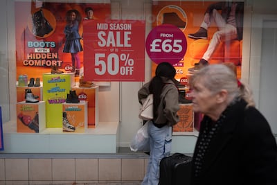 A shop in Wolverhampton advertises a mid-season sale days before the UK government's autumn budget. Getty Images