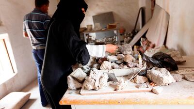 Safa al-Faqih crafts a stone in the old city of the capital, Sanaa, on April 18, 2018. Mohammed Huwais / AFP Photo