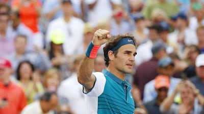 Roger Federer reacts after beating Philipp Kohlschreiber in the third round of the US open on Saturday. Andrew Gombert / EPA / September 5, 2015