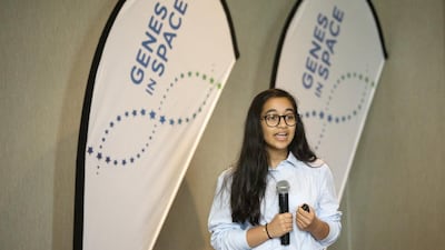 Alia Al Mansoori, 14, winner of the Genes in Space competition, makes her presentation yesterday. Christopher Pike / The National