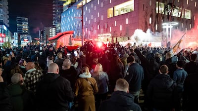 Hundreds of demonstrators gather to protest against the tightened coronavirus measures. EPA