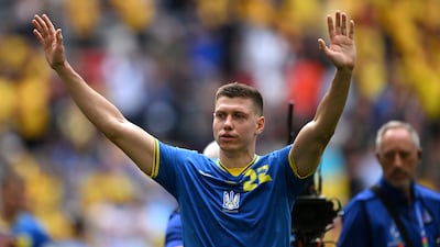 Mykola Matviyenko of Ukraine looks dejected as he acknowledges the fans. Getty Images