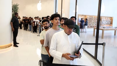 Apple fans queue to get their hands on the new devices