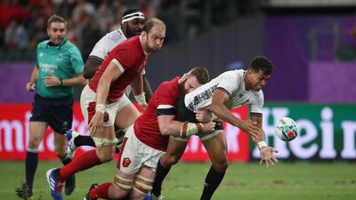Fiji's Ben Volavola in action with Wales' Jake Ball - Pool D - Wales v Fiji - Oita Stadium, Oita, Japan. REUTERS