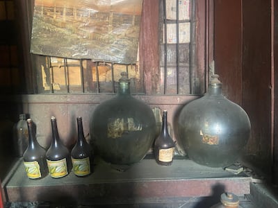 Dark-coloured glass pitchers are used as 'refrigerators' to keep the rose water fresh and cool. Photo: Safina Nabi